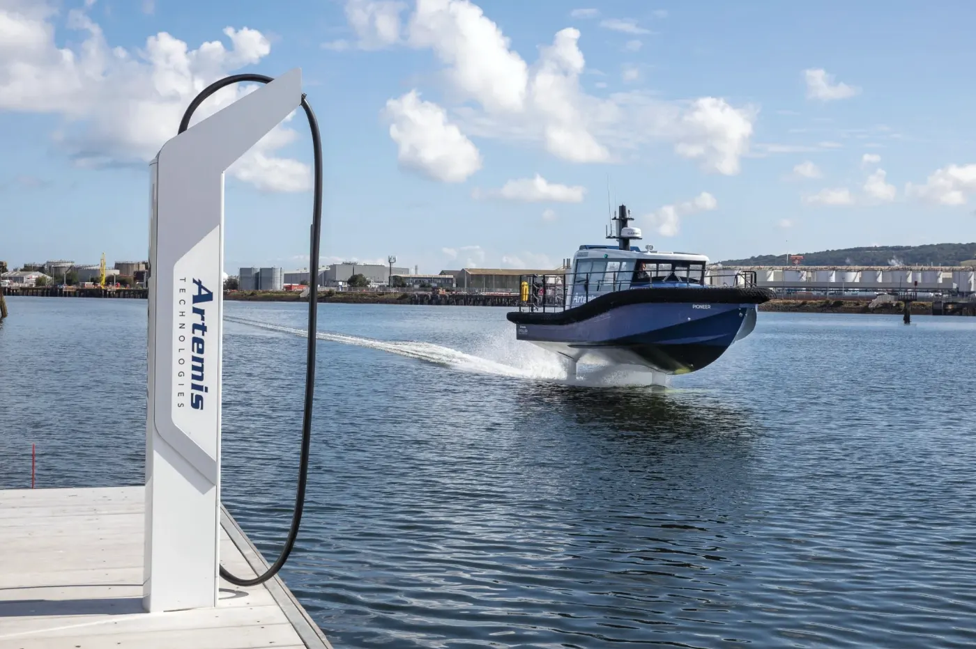 DC fast-charger on jetty · Artemis vessel underway